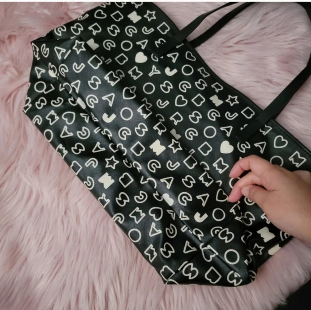 Marc by Marc Jacobs monogrammed PVC leather strap tote bag